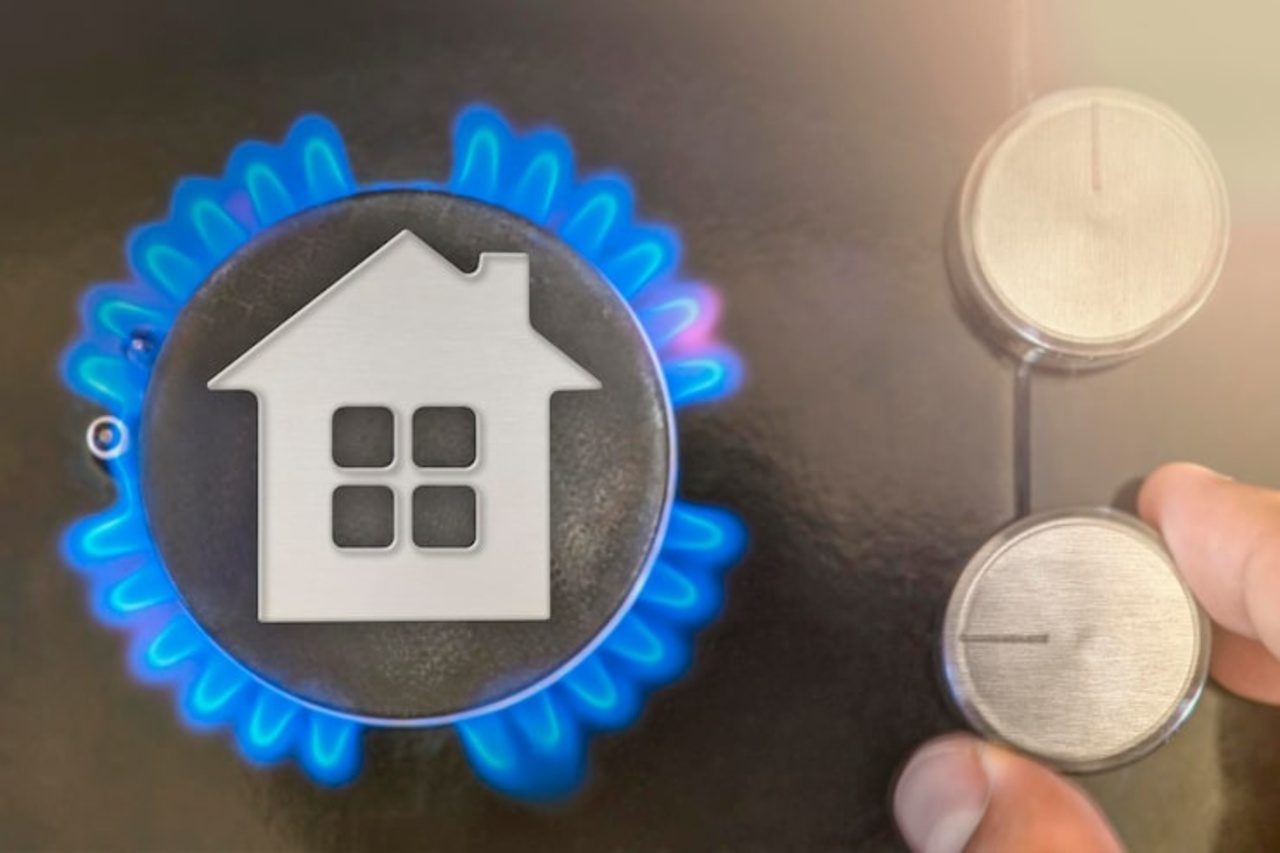 Gasfornuis met blauwe vlam dat aardgasverbruik en huishoudelijke energie symboliseert
